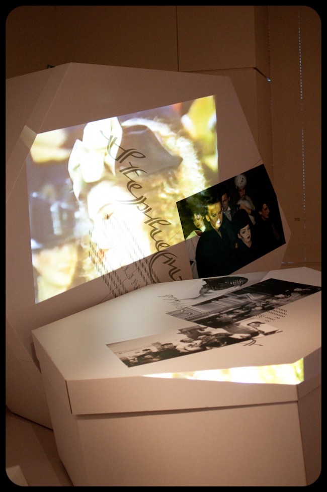 Videos Projected on Oversized Hat Boxes